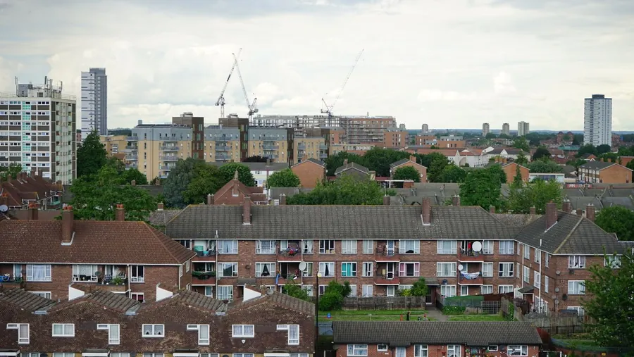 Low-rise brick flats and maisonette blocks with flat roofs in the Croydon area of south London