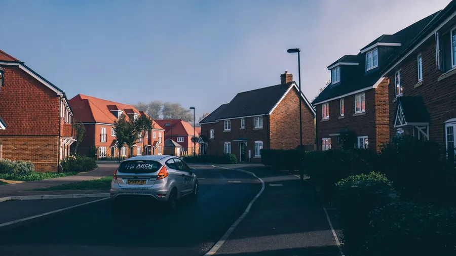 A new housing estate where every roof ridge and verge is mechanically fixed rather than mortar bedded