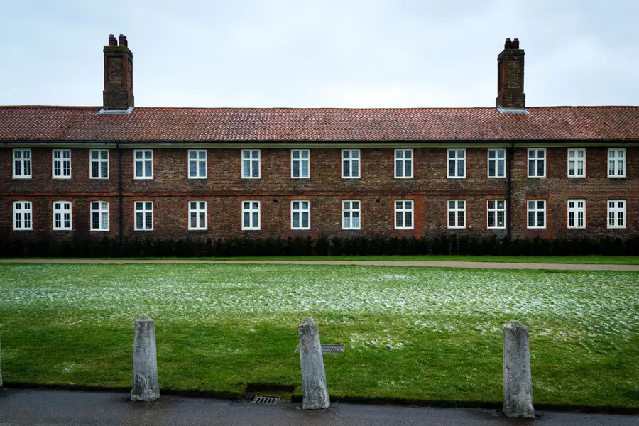 A long period brick terrace with a mortar bedded clay tile ridge line